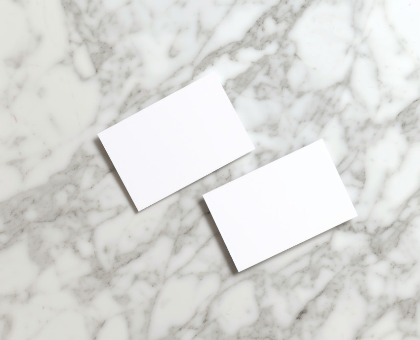 Blank business cards placed on a marble surface