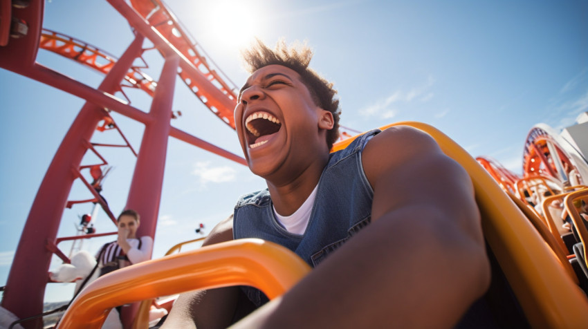 Roller coaster rider having a blast