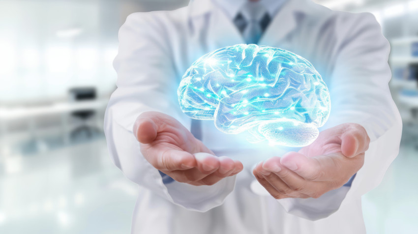 Close up of doctor hands holding a glowing holographic brain model with a blurred background symbolizing medical innovation and expertise