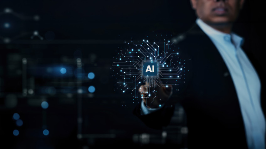 Businessman touching AI icon with finger on virtual screen showing technology and innovation concept