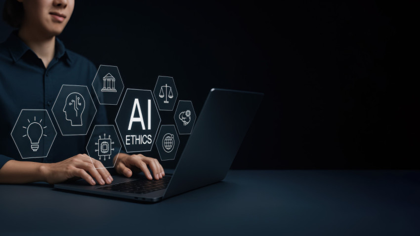 Person using laptop with icons for AI ethics Person using laptop with icons for AI ethics