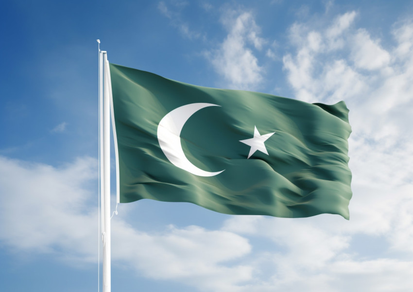 Pakistan Flag Against a Clear Blue Sky