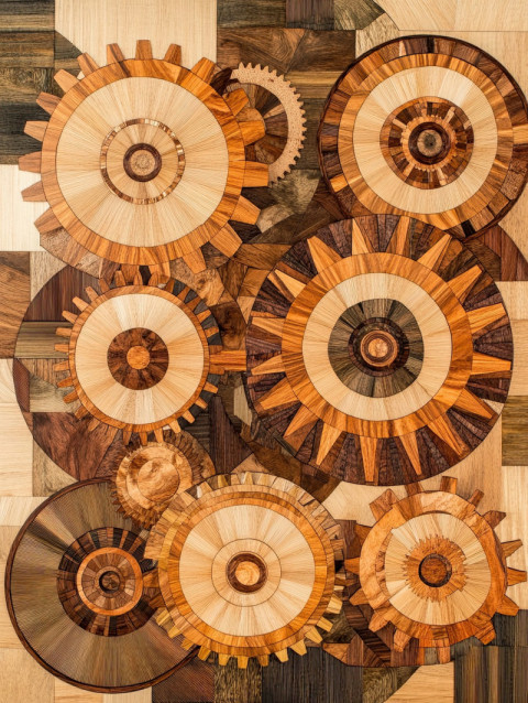 Interlocking gears crafted with precise marquetry wood inlays