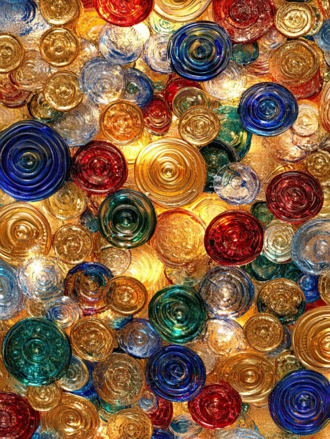 Golden coins arranged in a swirling pattern