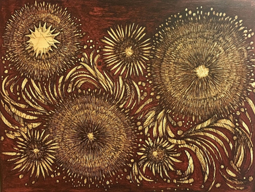 Fireworks pyrography on a panel