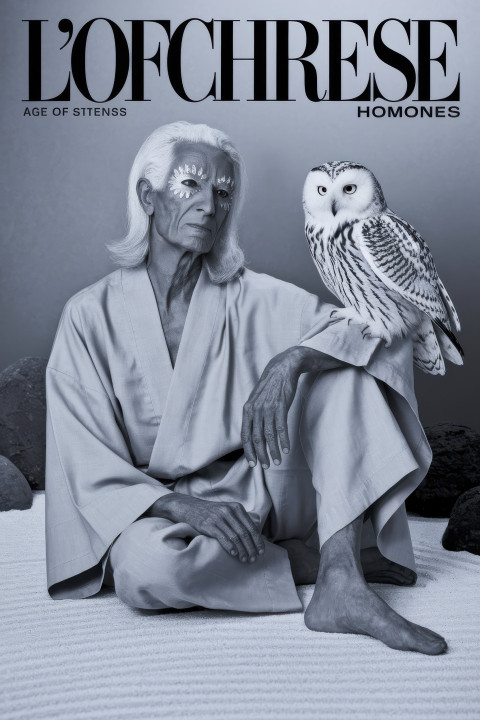 Elderly model in white kimono with snowy owl in zen garden